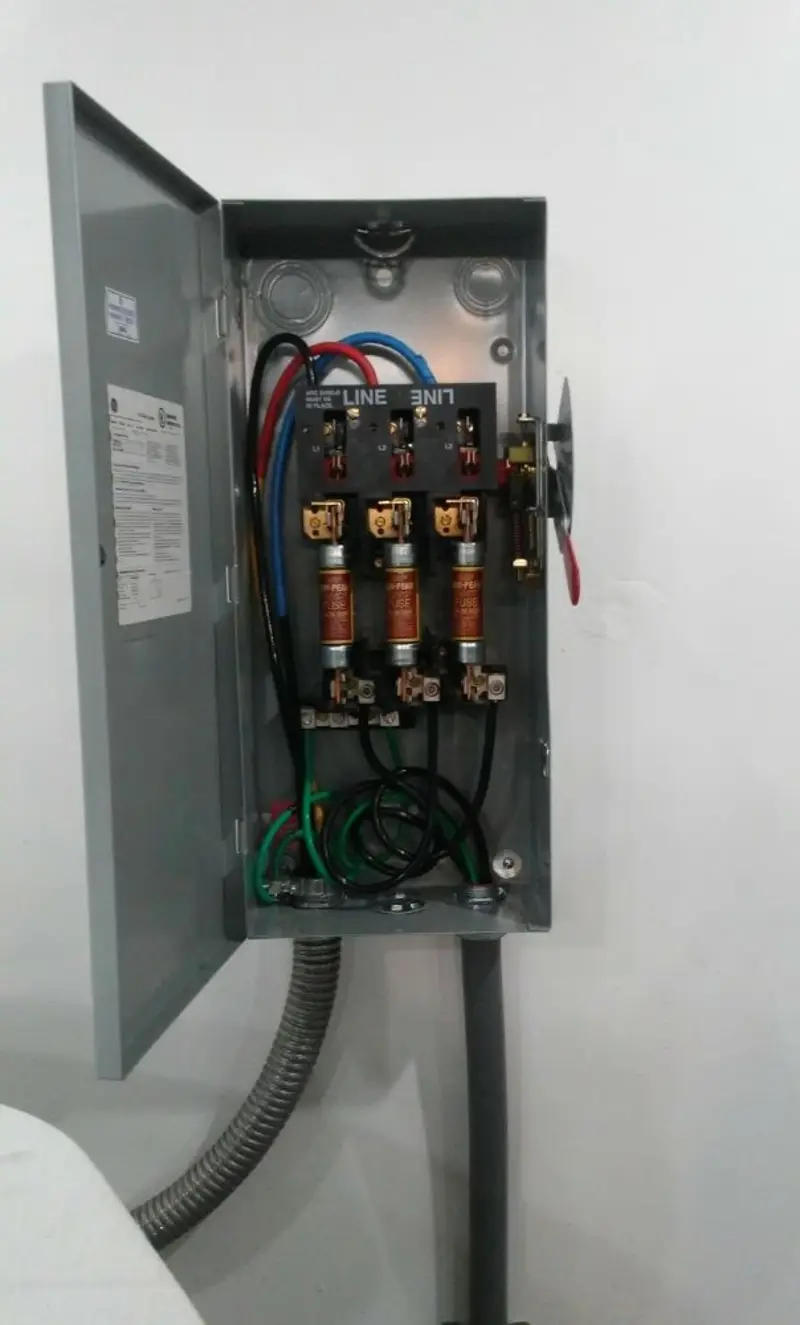 Three-phase disconnect switch installed for Smoke Detector Installation in Cocoa